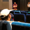 Lets DOK Teambildung: Bild eines Kinosaales mit mehreren Personen