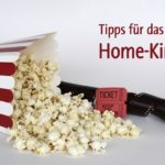 Umgefallene Popcorntüte. Schriftzug