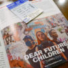 Postkarte Dear Future Children auf der Kinotheke