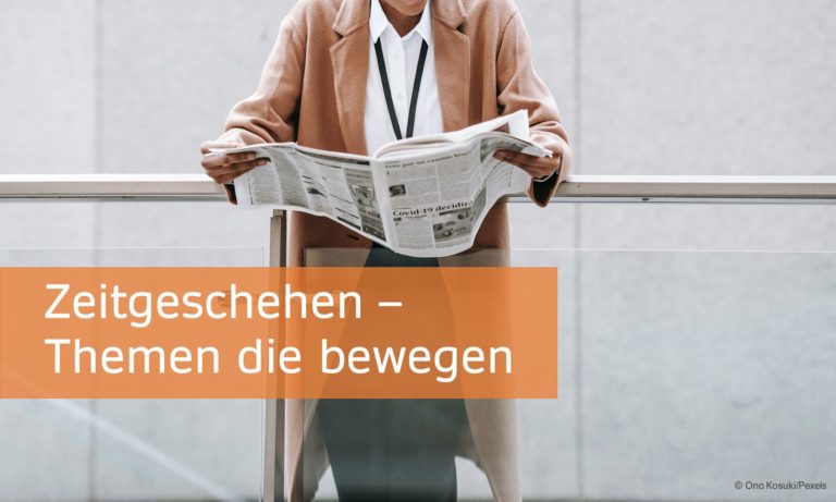 Frau liest Zeitung