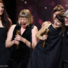 Steffi Niederzoll (Regie), Melanie Andernach (Produzentin) und weitere Personen bei der Verleihung des Deutschen Filmpreises (Foto; Eventpress/Deutscher Filmpreis 2024)